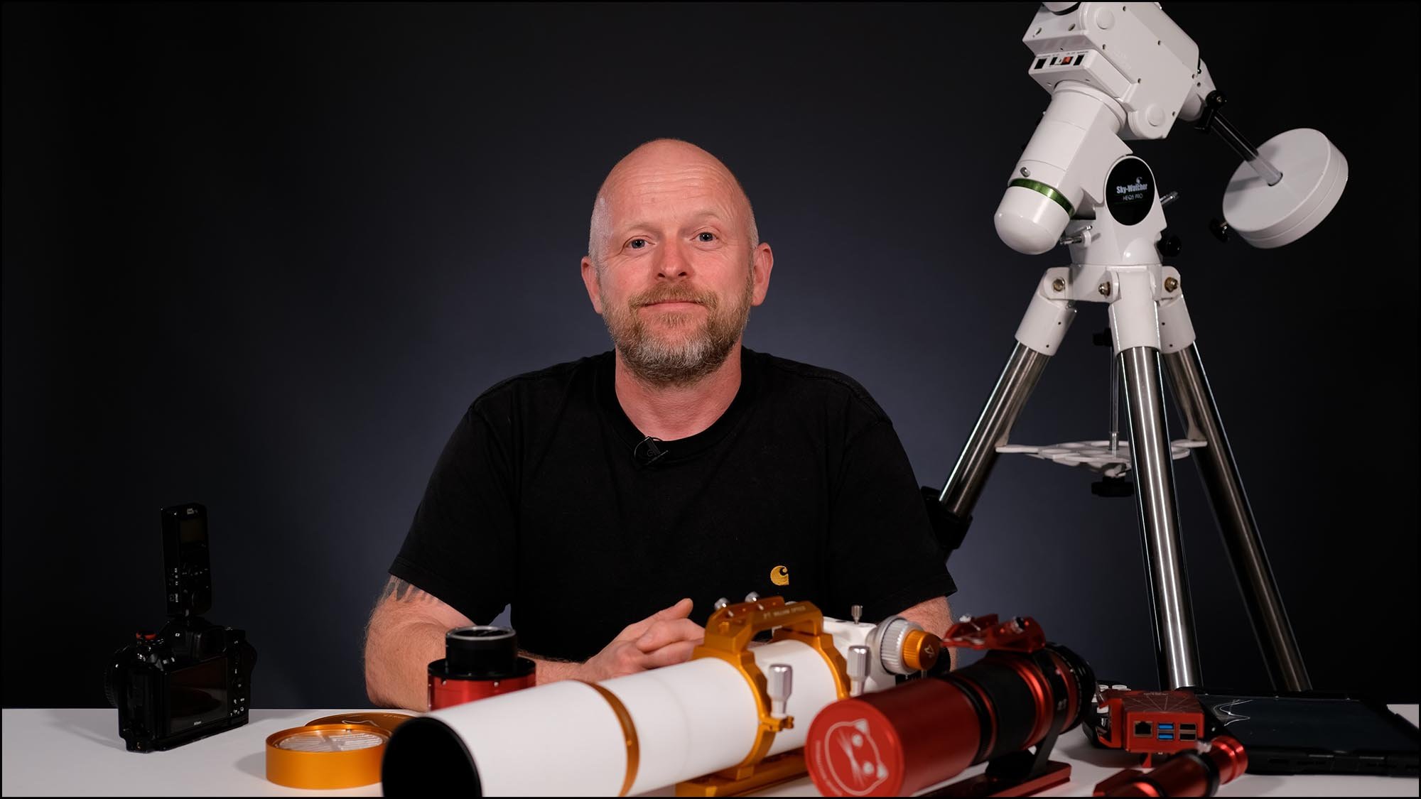 Ben Bush with astrophotography equipment on table