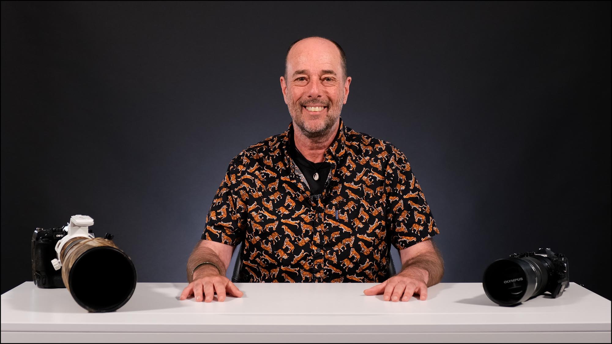 Andy Rouse with two cameras on table