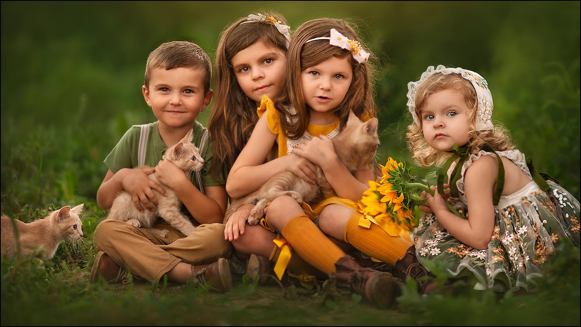 Professional portrait of a group of children with kittens