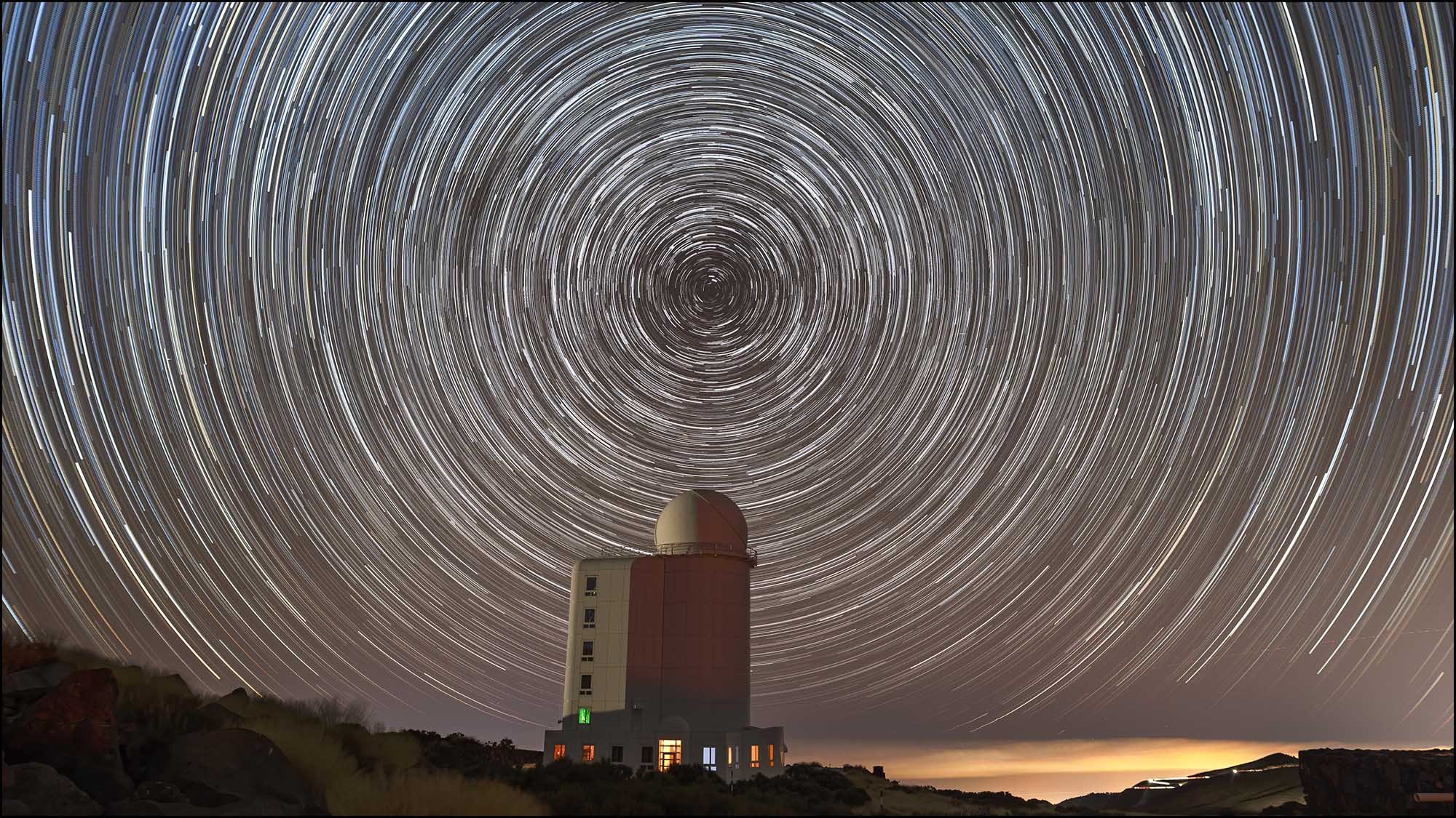 Star trail over observatory