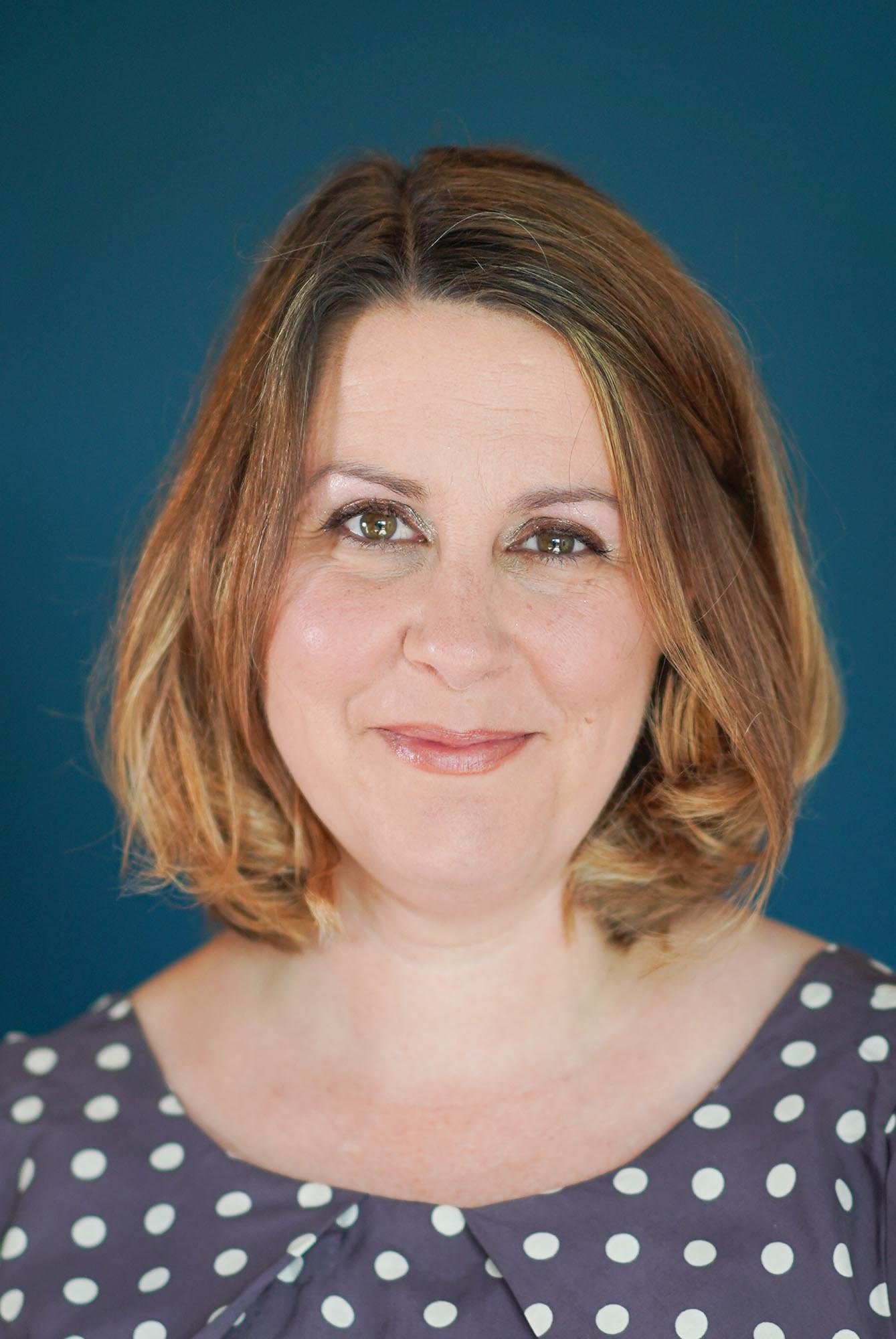 Profile picture of Molly Hollman, professional flower and plant photographer